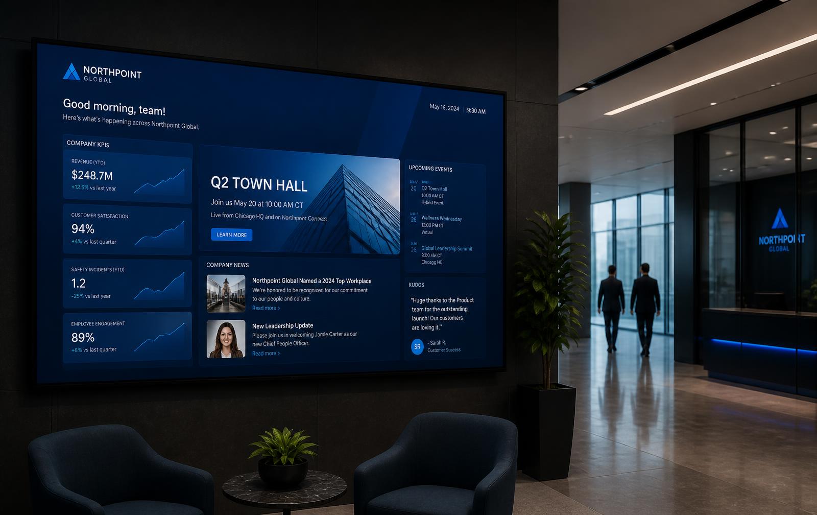 TV corporativa exibindo painel de comunicação interna em um lobby empresarial